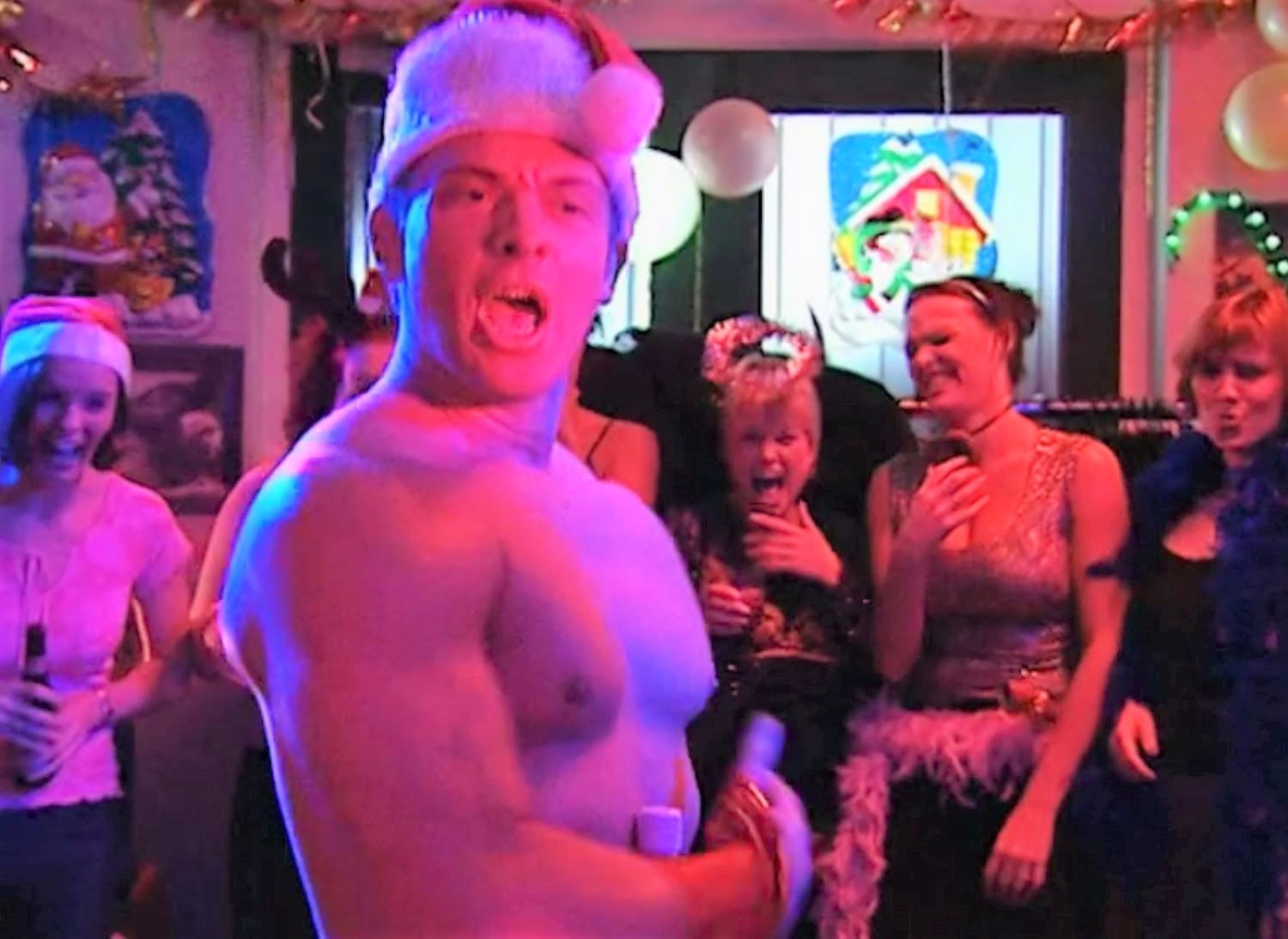 Coronation Street's stripper Sam gets his muscles out dressed as Santa while Karen and Janice laugh raucously