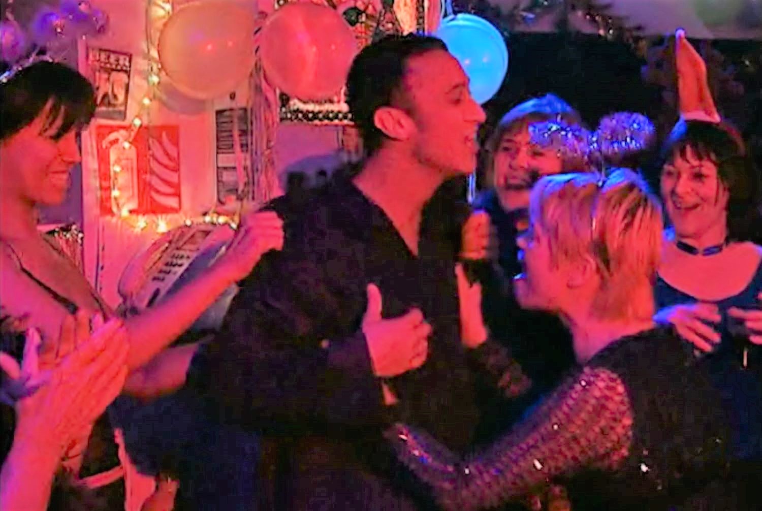 Janice and Bobbi in Coronation Street try to strip Vik in the factory