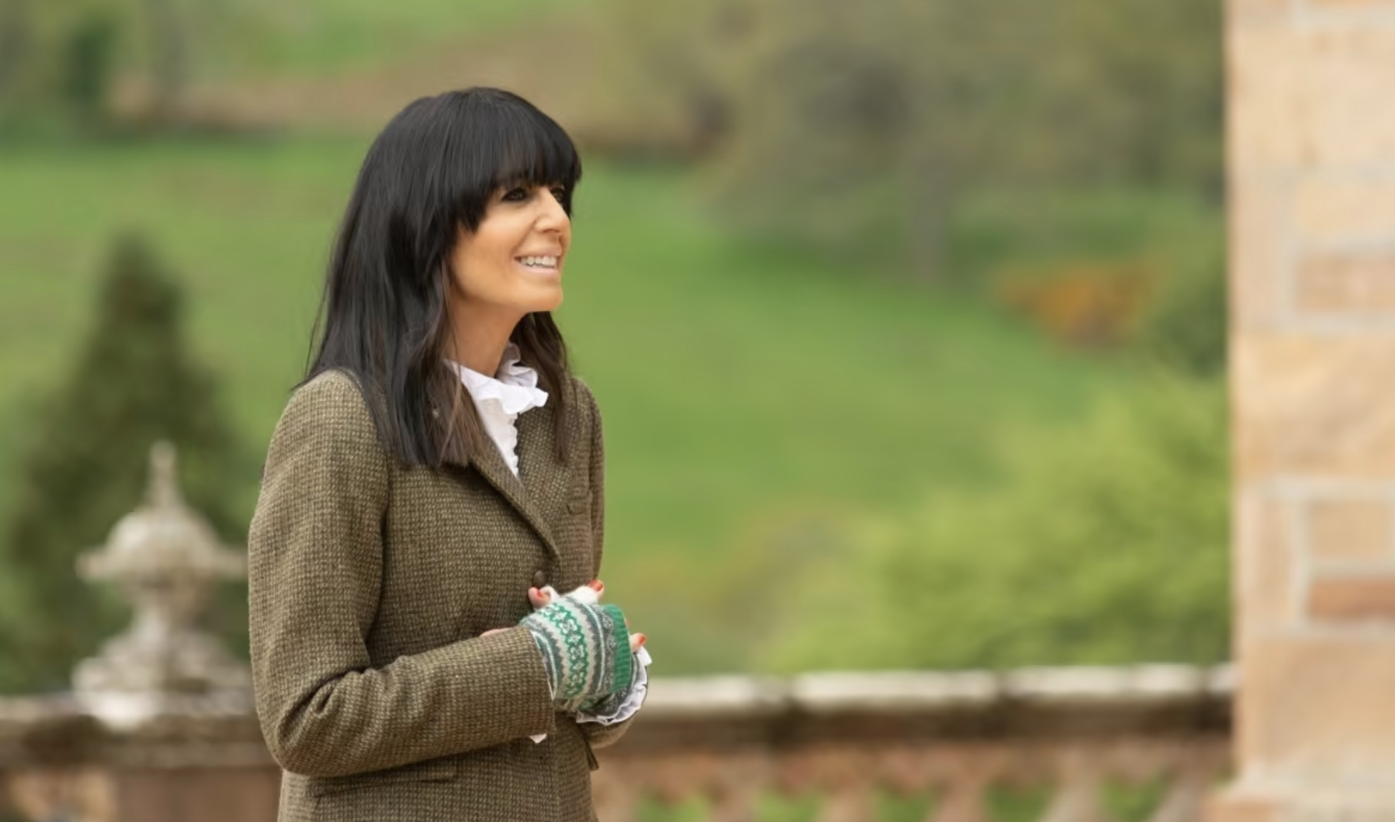 Claudia Winkleman hosting The Traitors