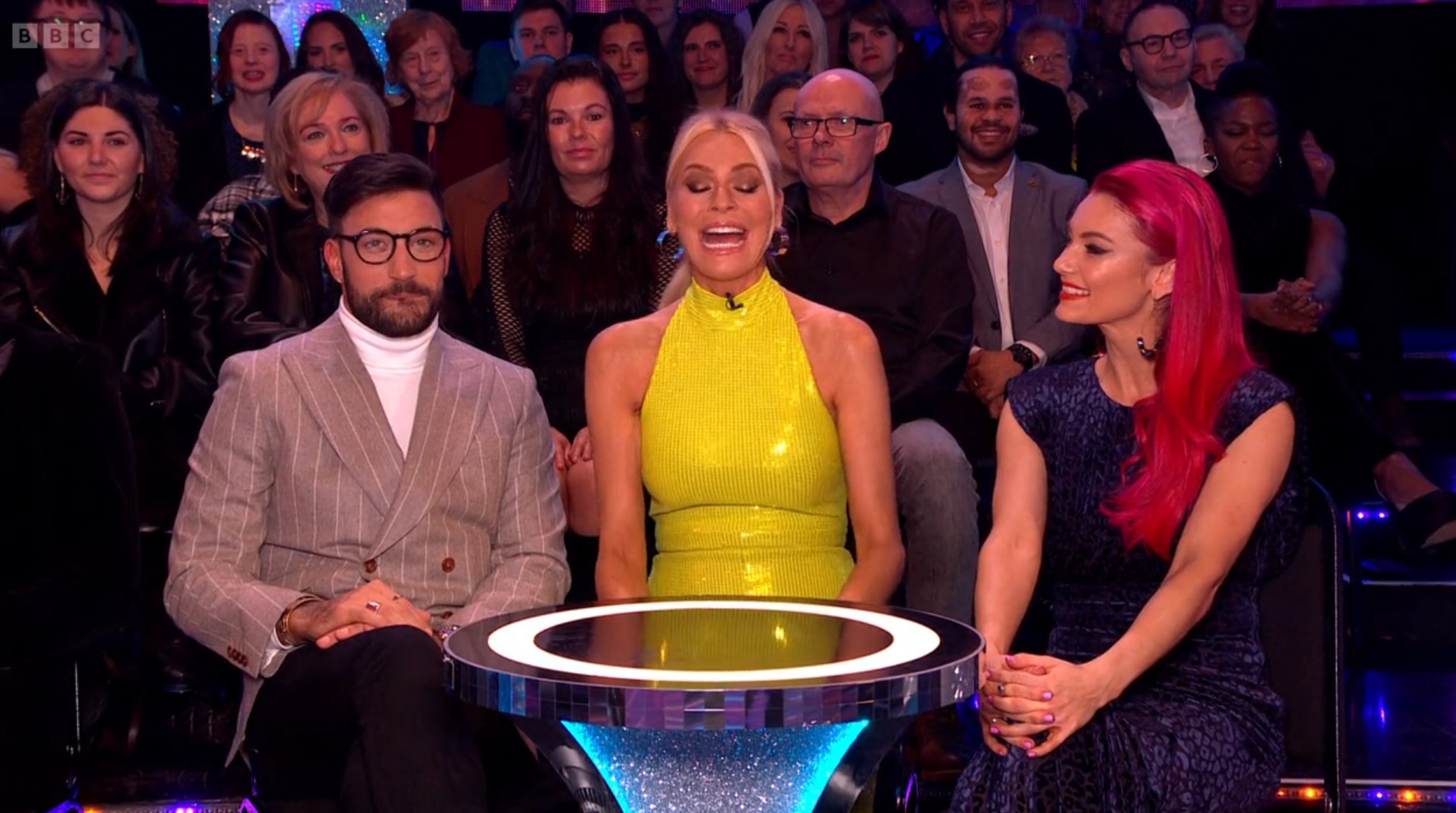 Giovannie Pernice Tess Daly and Dianne Buswell sit around a table in the Strictly Come Dancing audience