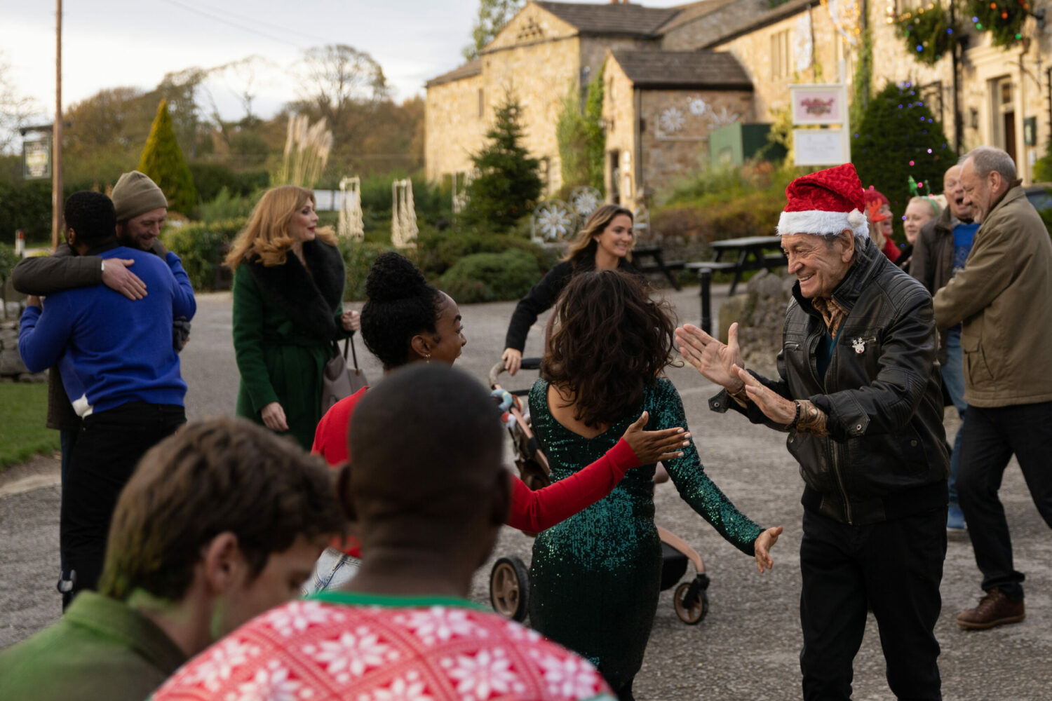 The Emmerdale villagers including Rodney, Bernice, Manpreet, Jimmy, Marcus and Ethan dance in the street
