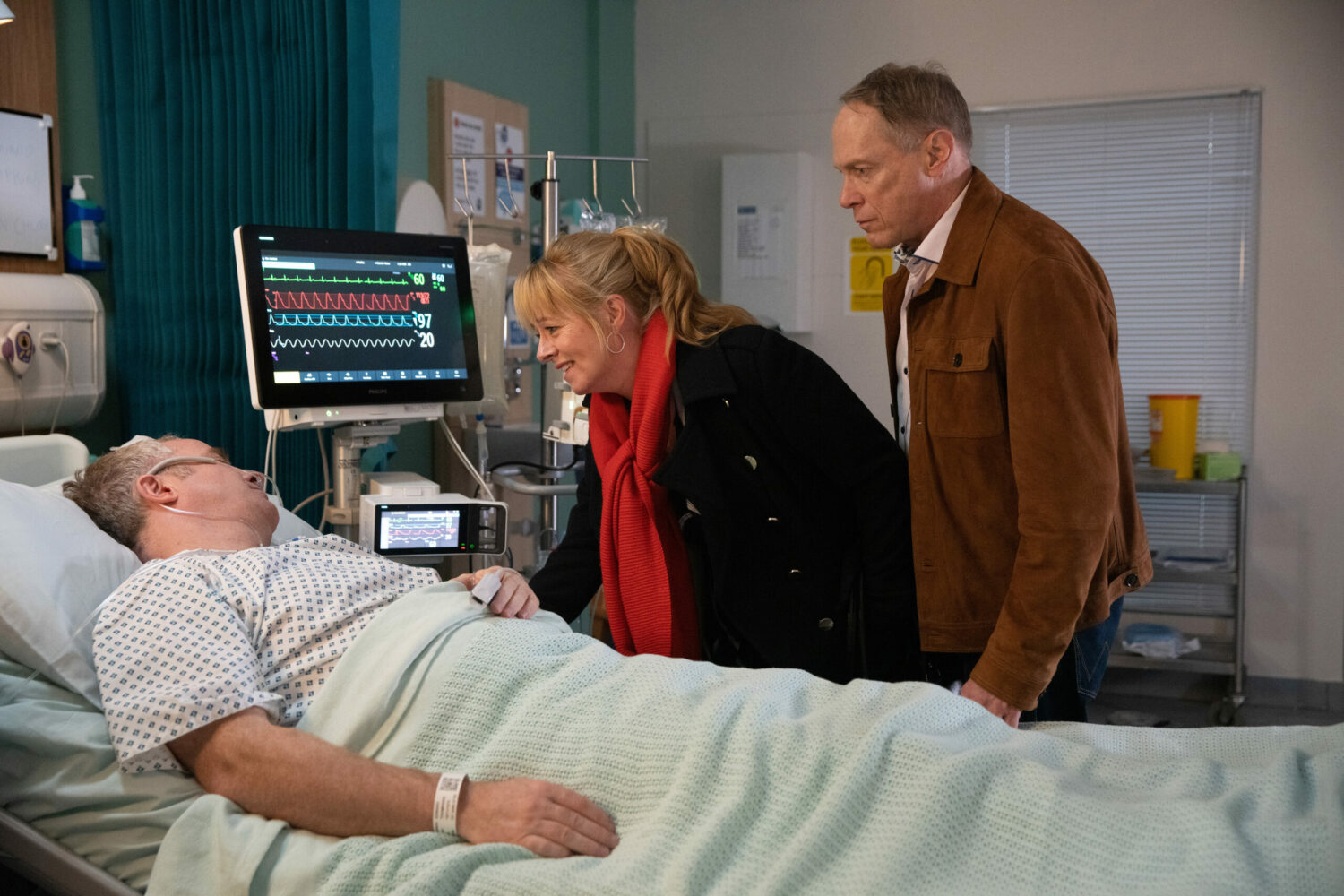 Stephen and Jenny look over Teddy in hospital on Corrie