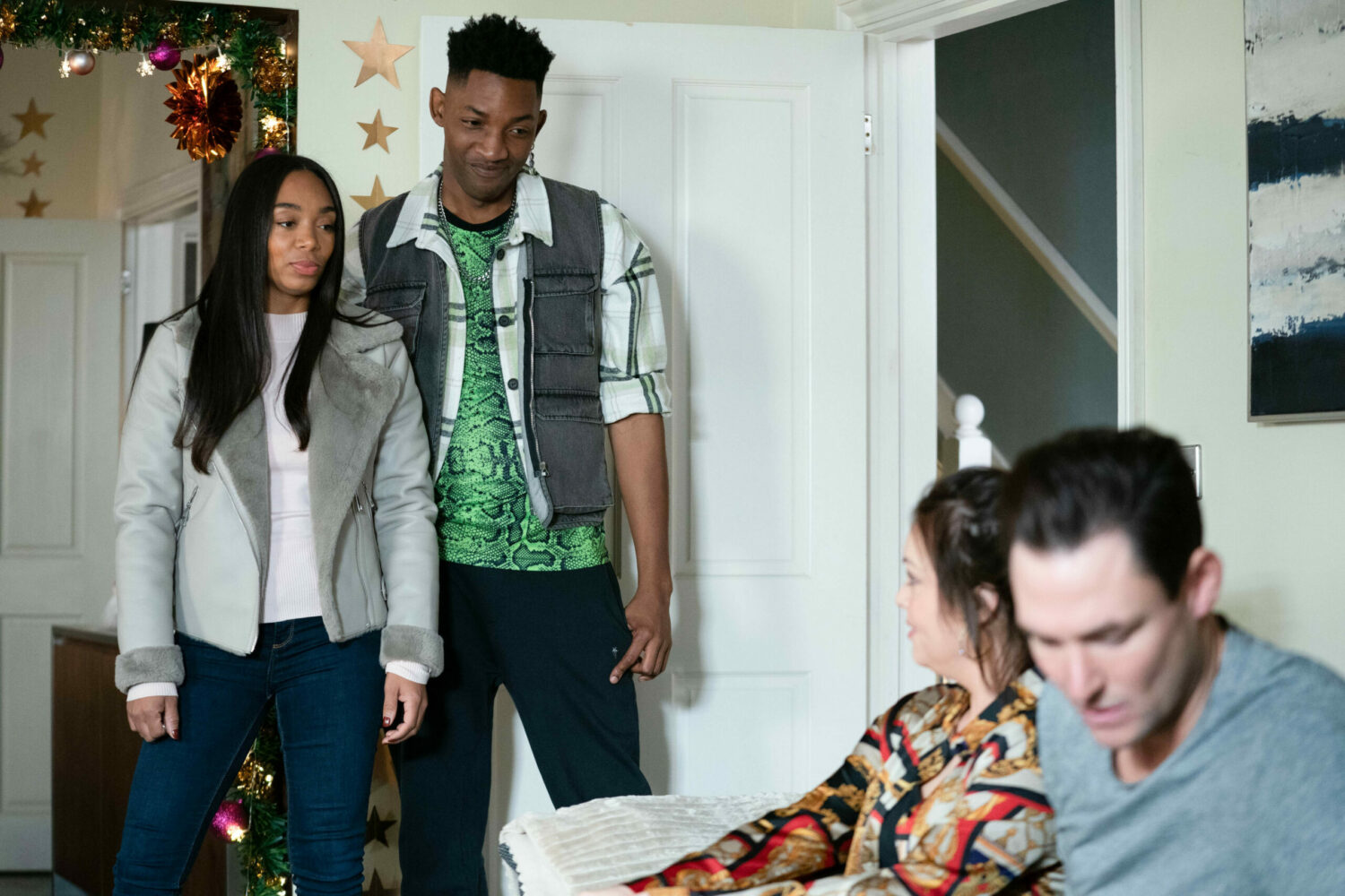 Chelsea and Felix smile at Whitney and Zack