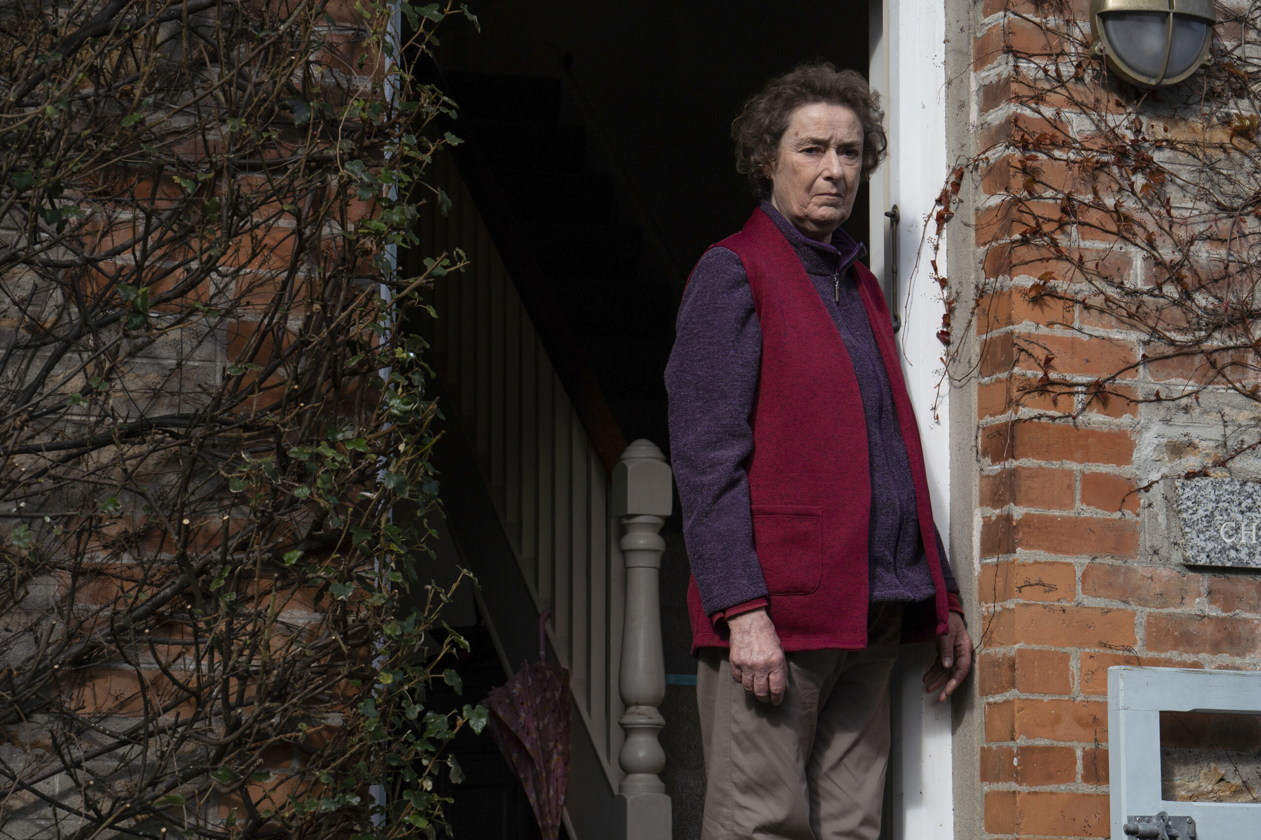 Joan Nancarrow stands outside her home in Strike