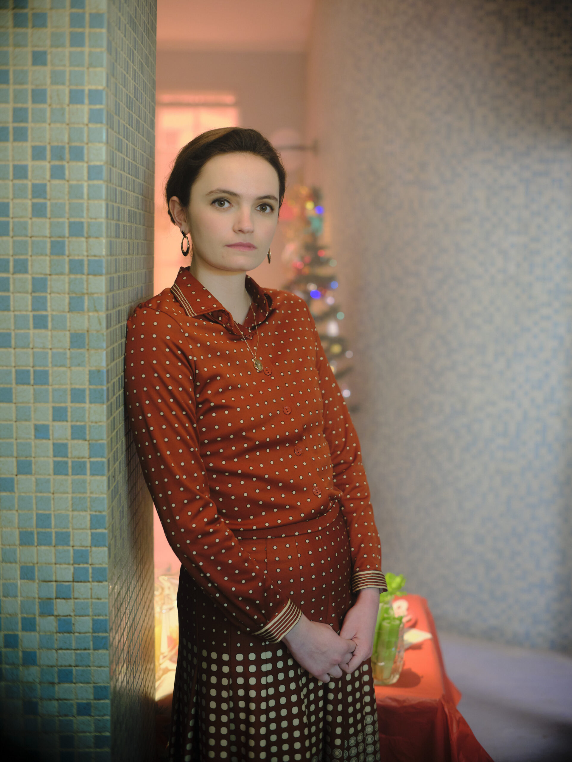 Dr Margot Bamborough leans against a wall in Strike troubled blood