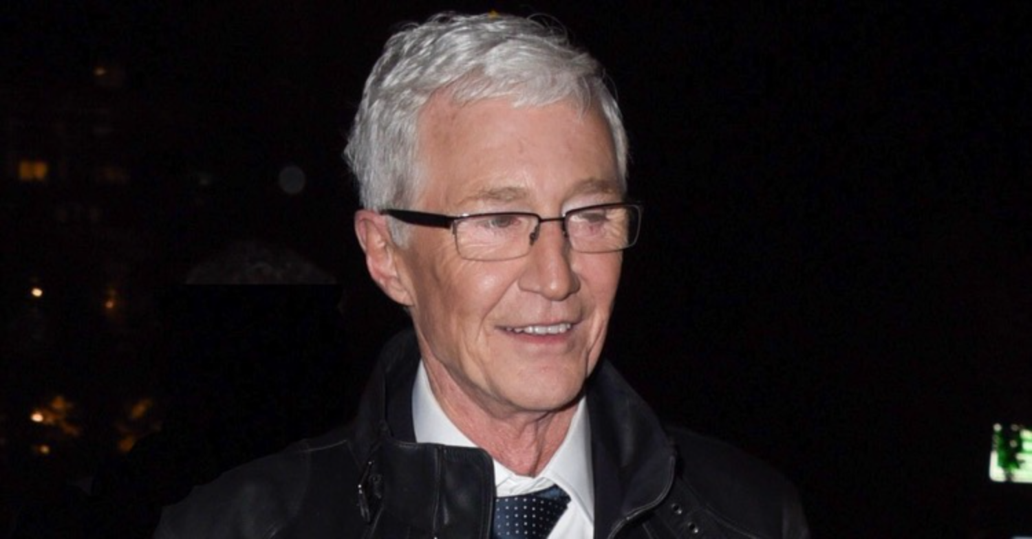 Paul O’Grady smiling in the street 
