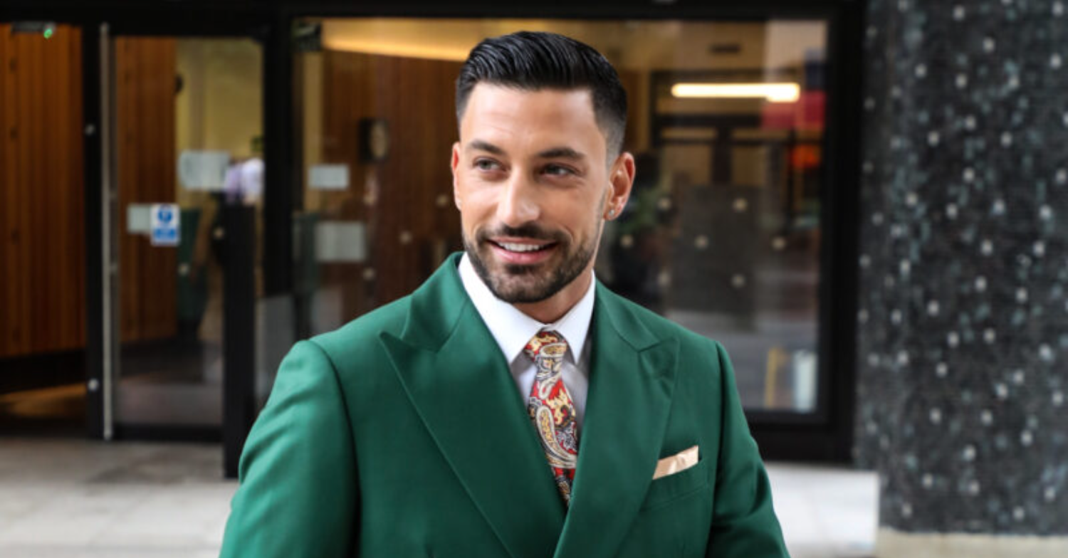 Giovanni Pernice smiling in the street for fans