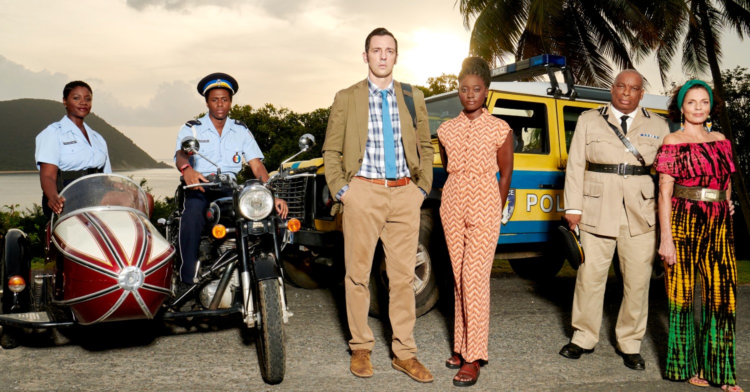 The regular cast of Death in Paradise in character