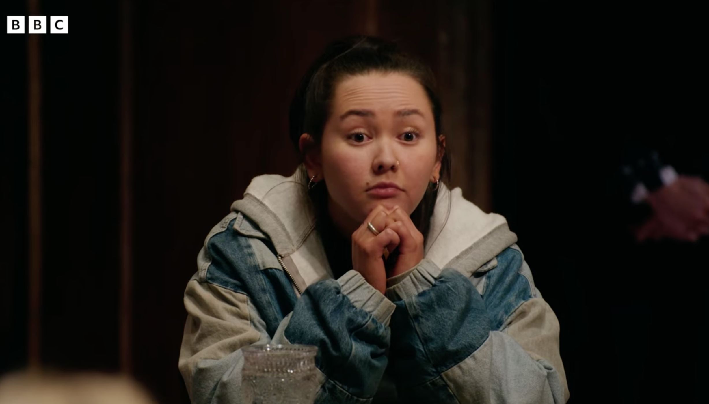 The Traitors: Alyssa looking shocked at the round table