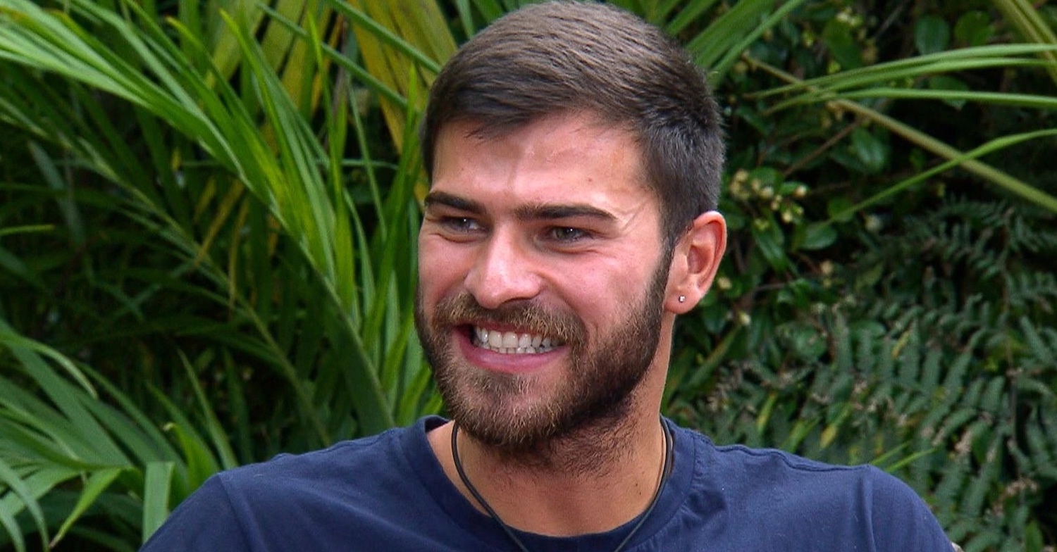 Owen Warner grinning on I'm A Celebrity 