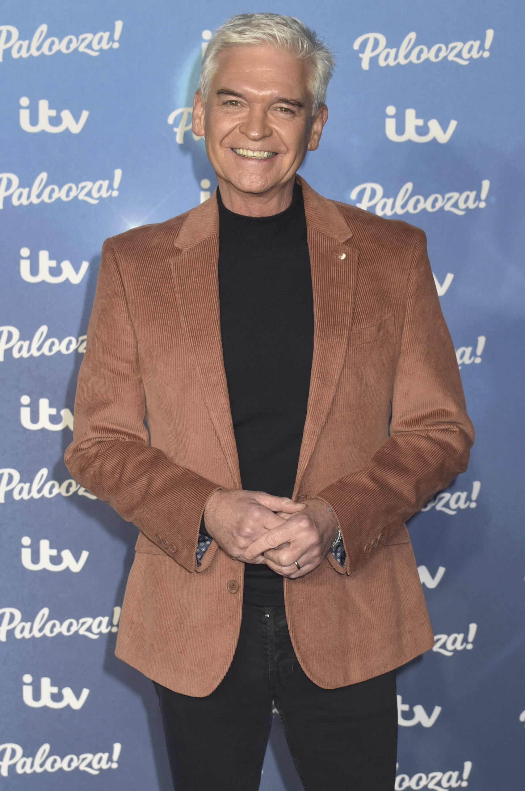 Phillip Schofield smiling on the red carpet