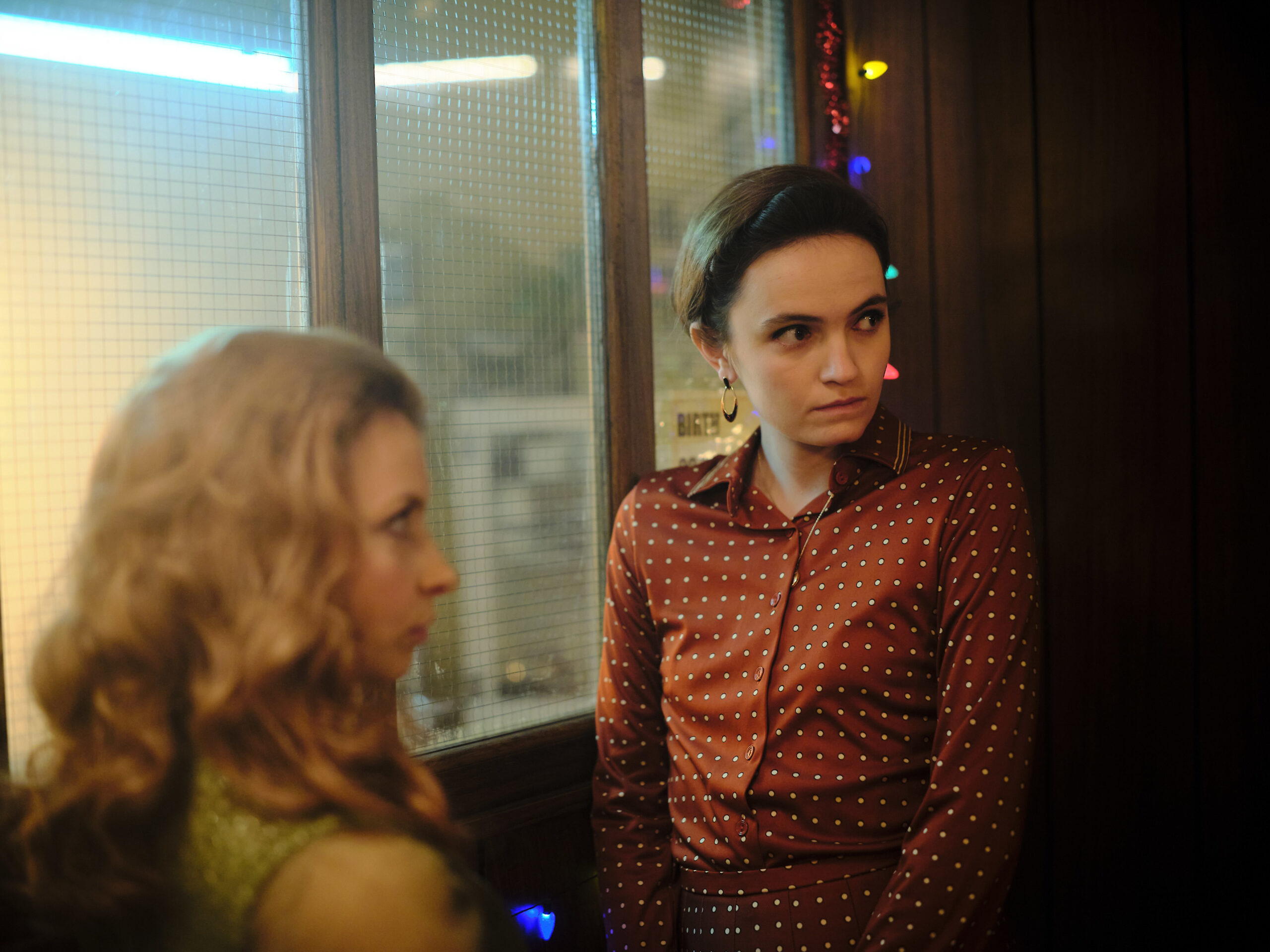 Dr Margot Bamborough looks to her right in Strike Troubled Blood episode 4