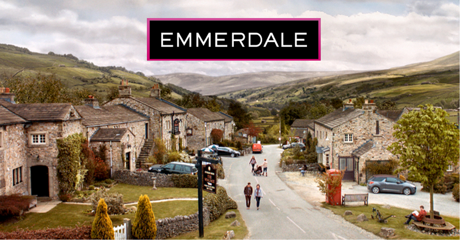 Emmerdale village with a pink bordered 'Emmerdale' logo