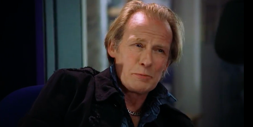 Love Actually ageing rocker Billy smiling