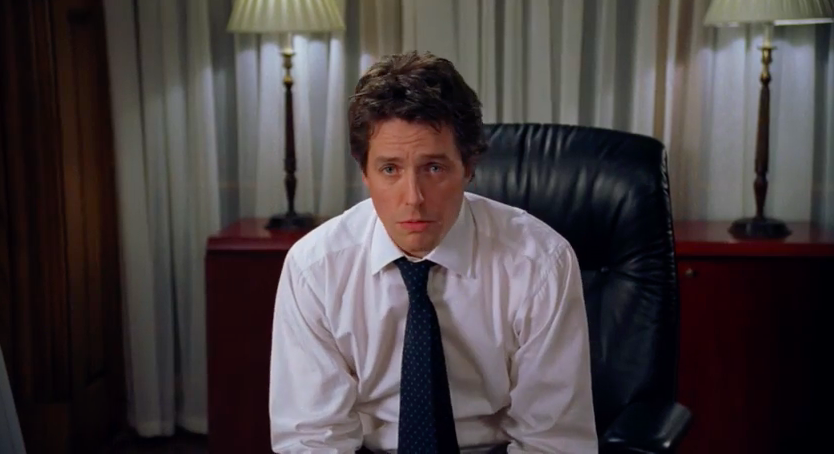 Love Actually Prime Minister Hugh Grant in a white shirt and tie