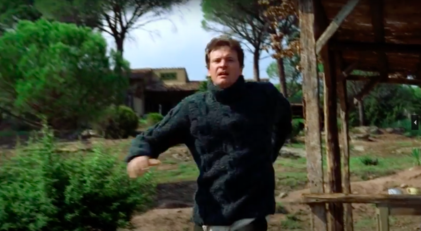 Love Actually character Jamie running in a chunky jumper