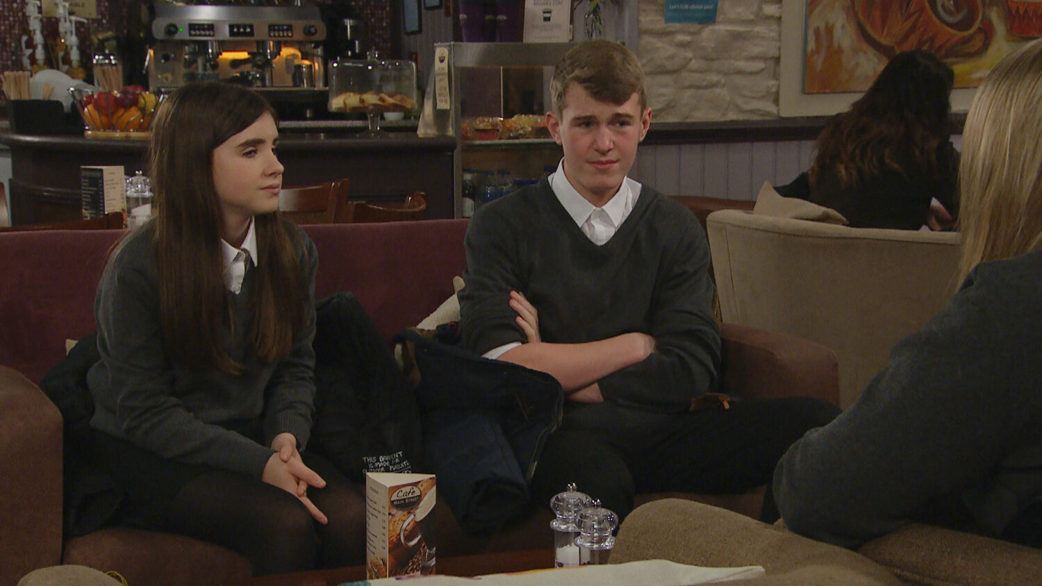 Emmerdale's April and Arthur are talking in the café