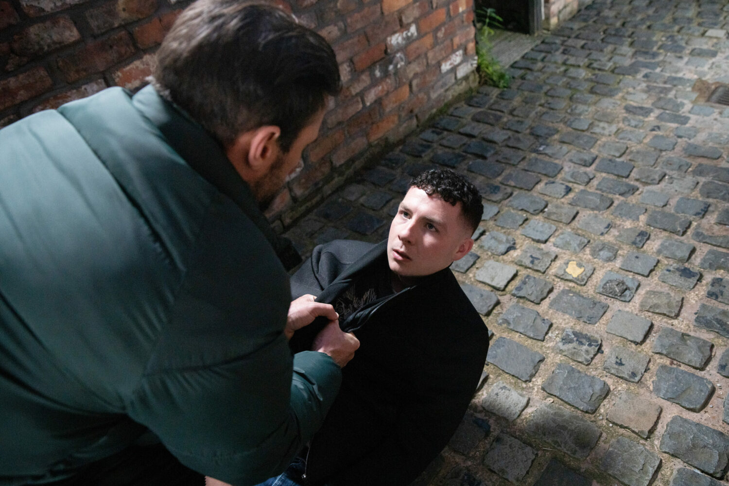 Coronation Street's Damon is holding Jacob to the ground