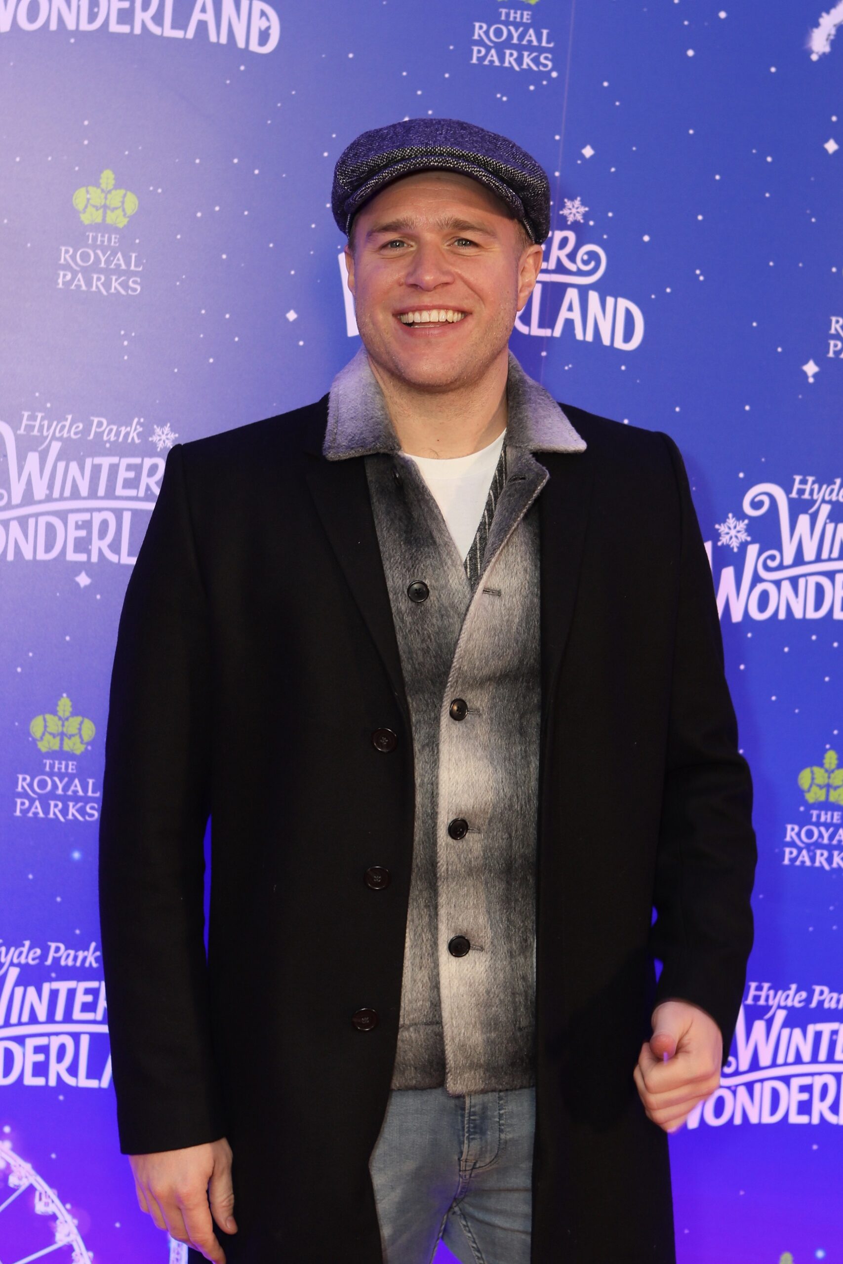 Olly Murs smiling on the red carpet