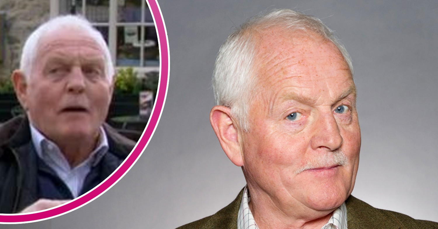 Emmerdale character Eric Pollard looking smug