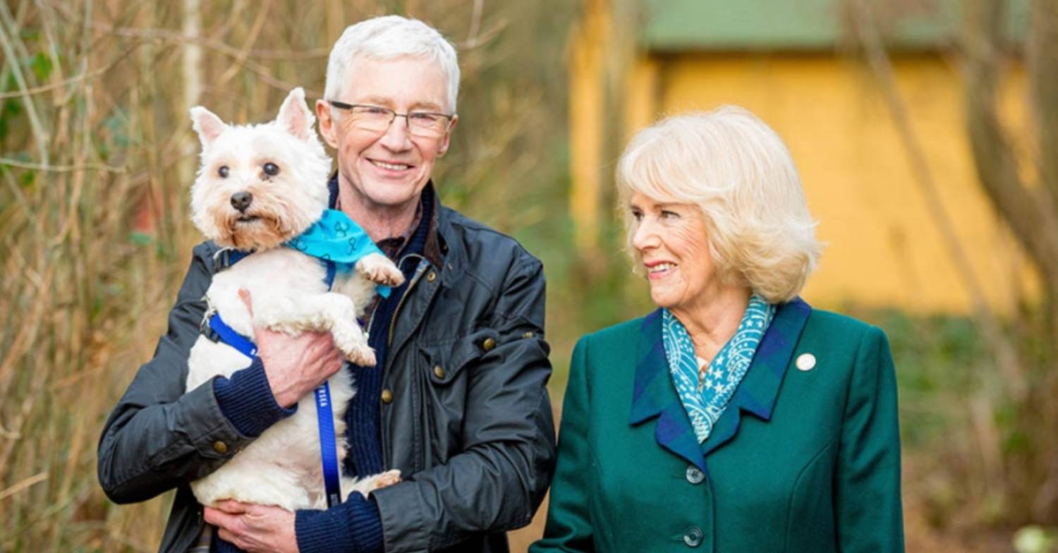 Paul O'Grady walks with Camilla and another furry pal