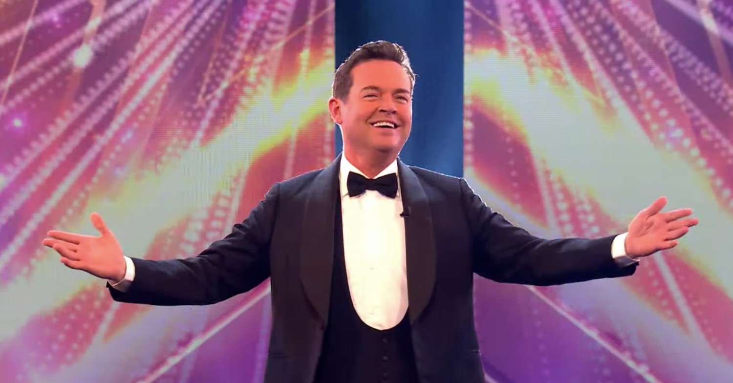Stephen Mulhern with his arms open wide on BGT: Ultimate Magician