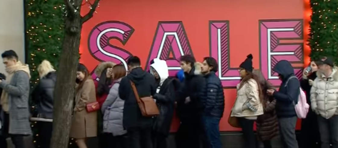 Boxing Day sales: People lining up outside a shop