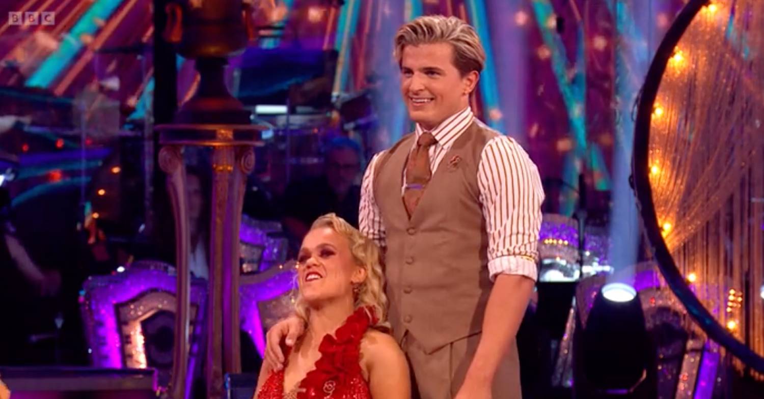 Nikita Kuzmin smiling with Ellie Simmonds on Strictly