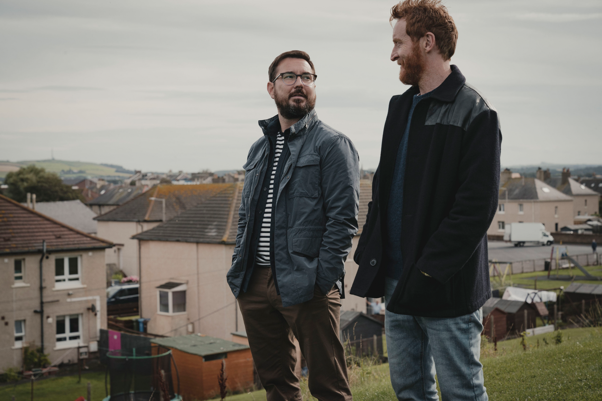 Martin Compston and Tony Curran standing together 