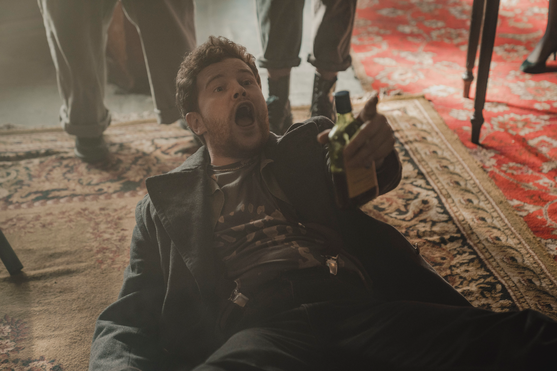 Matt Littleson lying on the floor in Mayflies