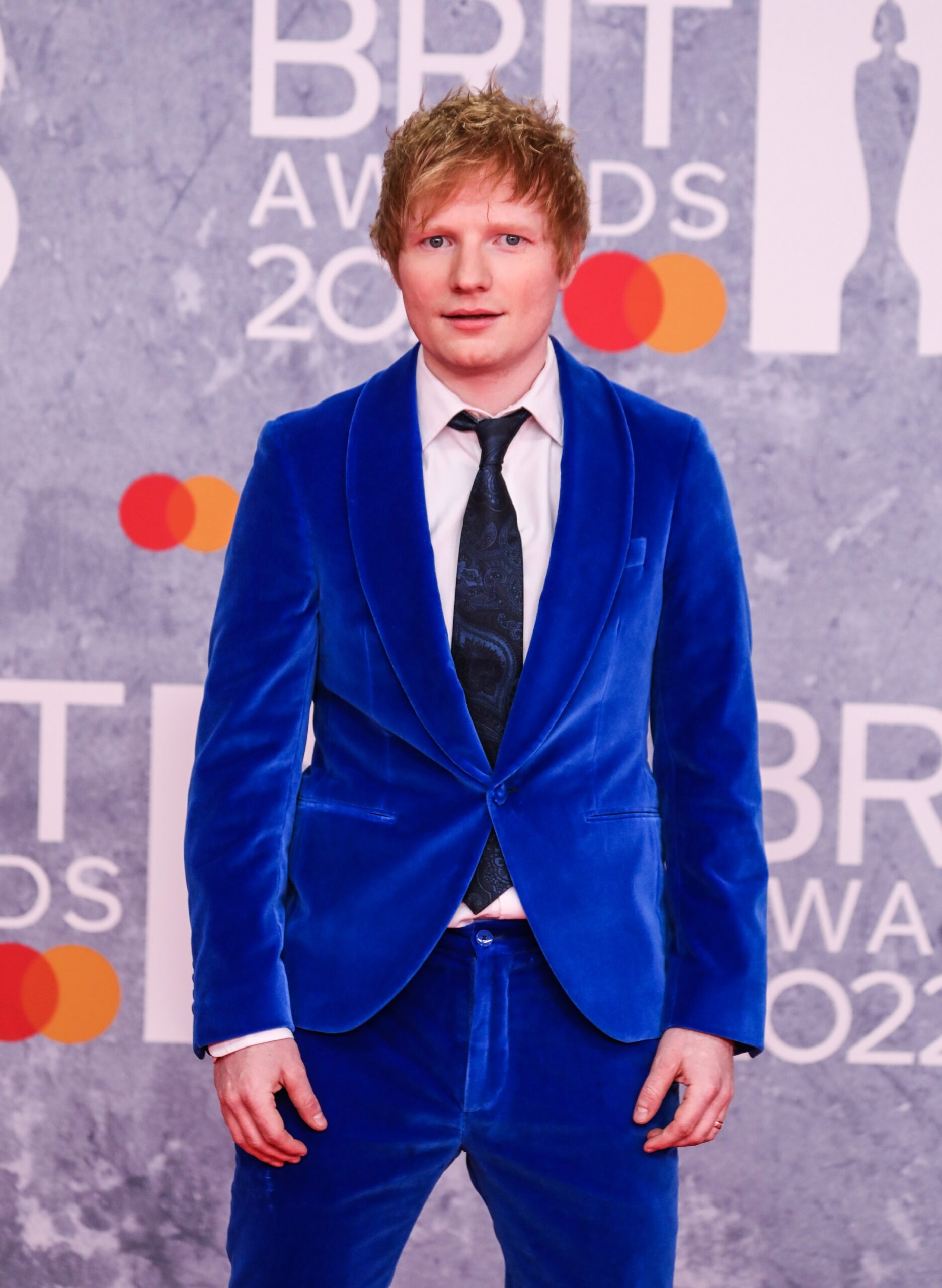 Ed Sheeran in a blue suit at the Brits