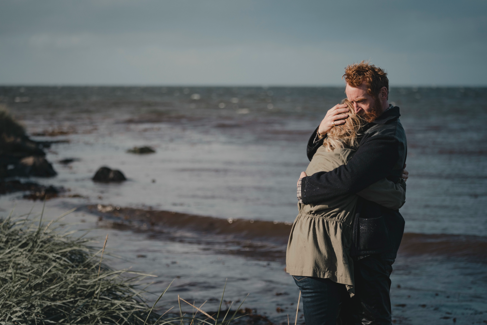 Tony Curran and Ashley Jensen hugging in Mayflies