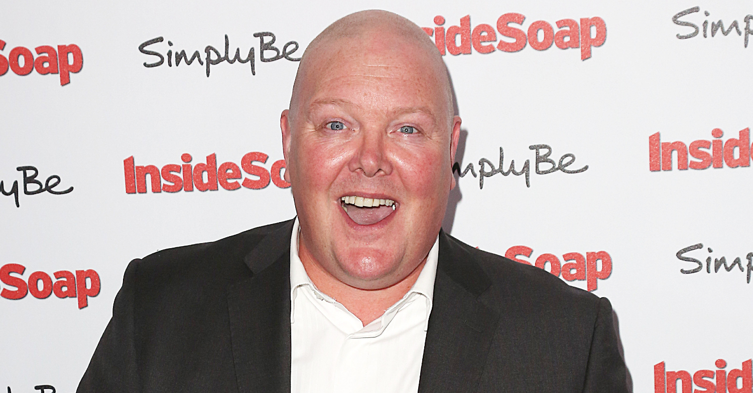 Emmerdale's Dominic Brunt is smiling on the red carpet