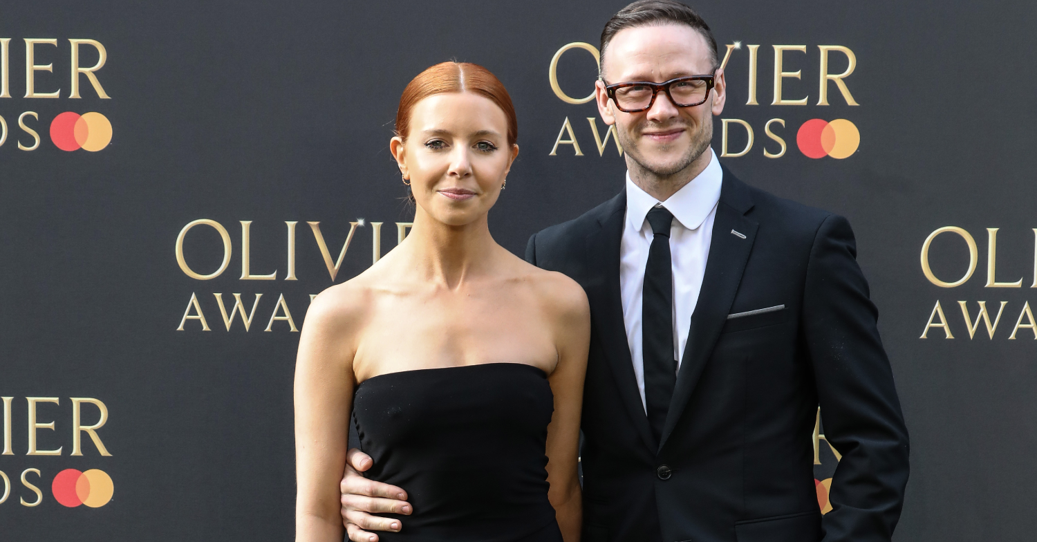 Stacey Dooley and Kevin Clifton posing for photos