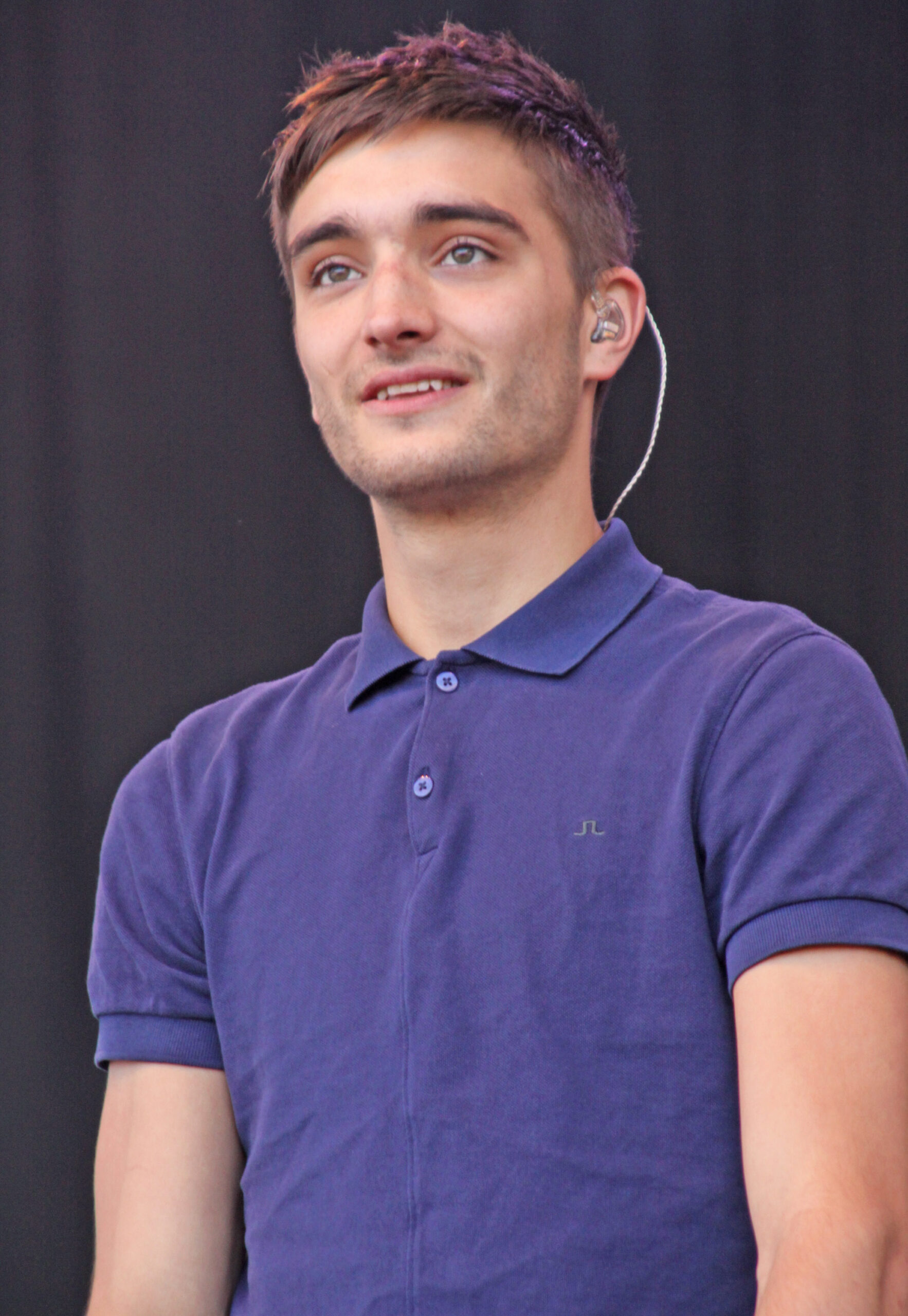 Tom Parker on stage with The Wanted