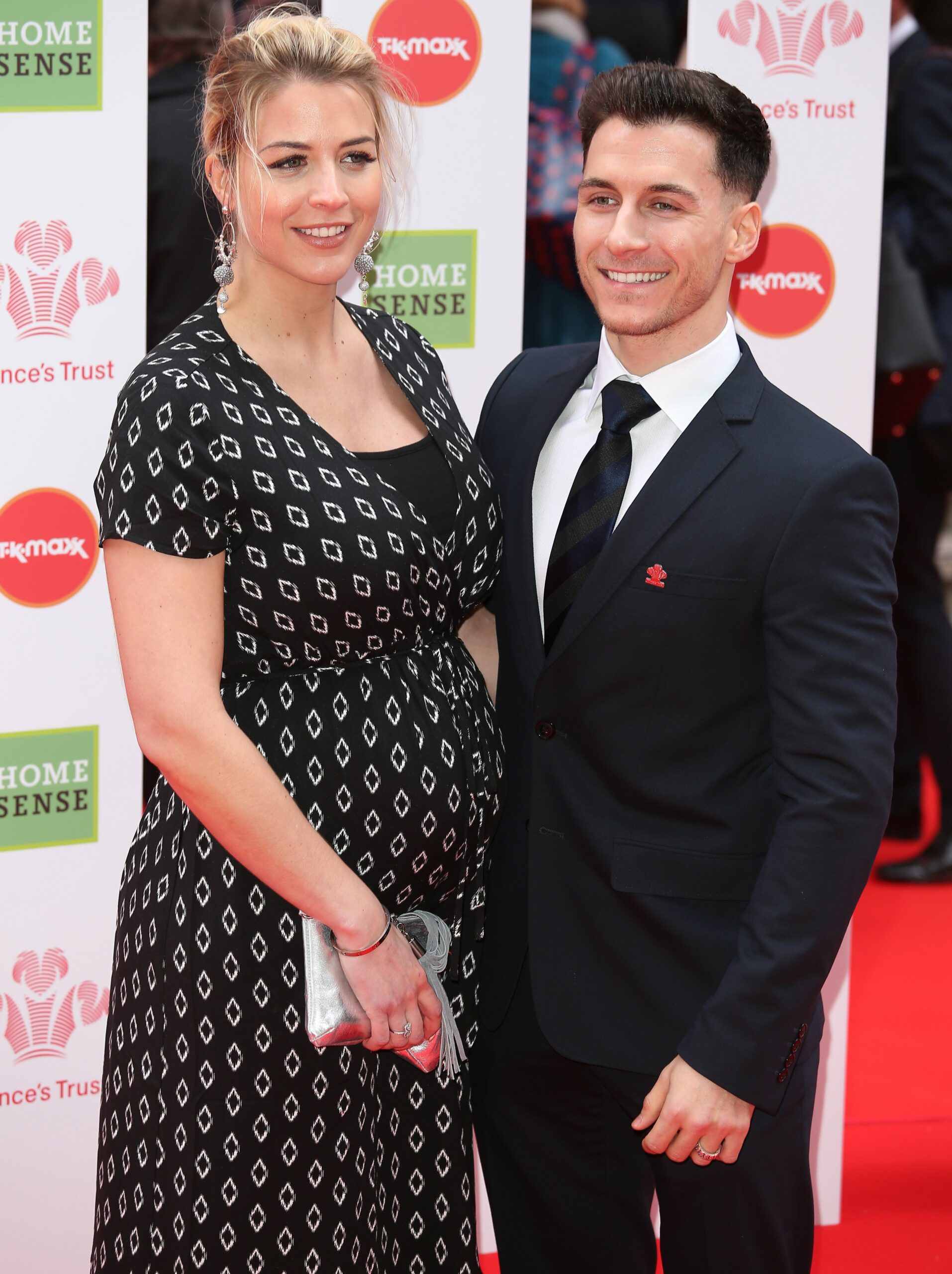 Gemma Atkinson smiles alongside Gorka Marquez at event