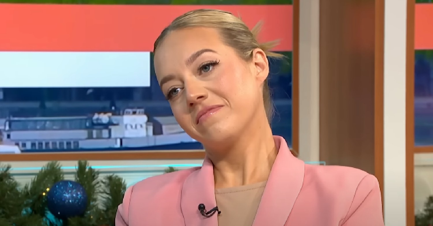 Tom Parker widow Kelsey tilting her head during GMB interview
