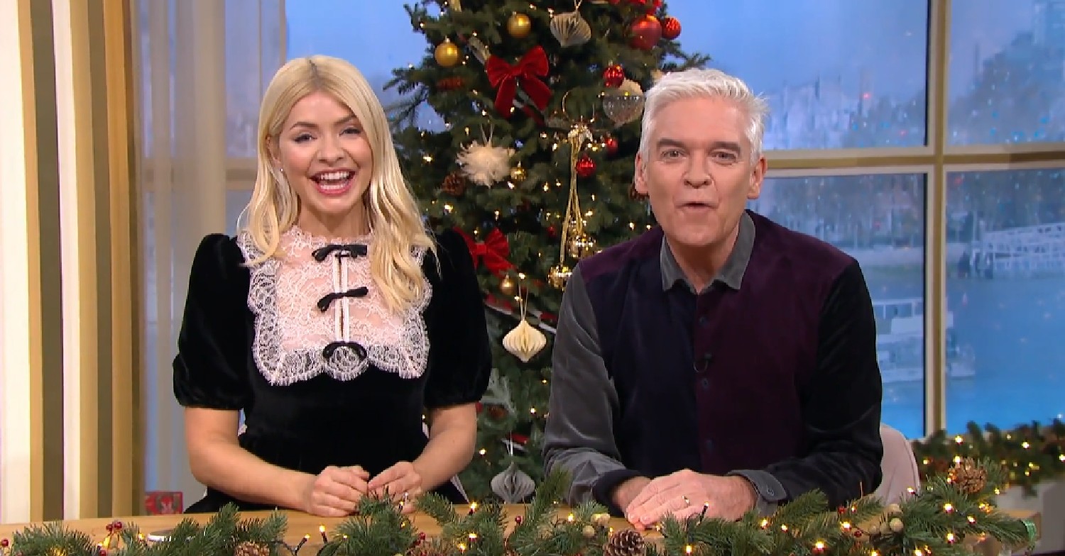 Holly and Phil hosting This Mornign today with Christmas Tree in back