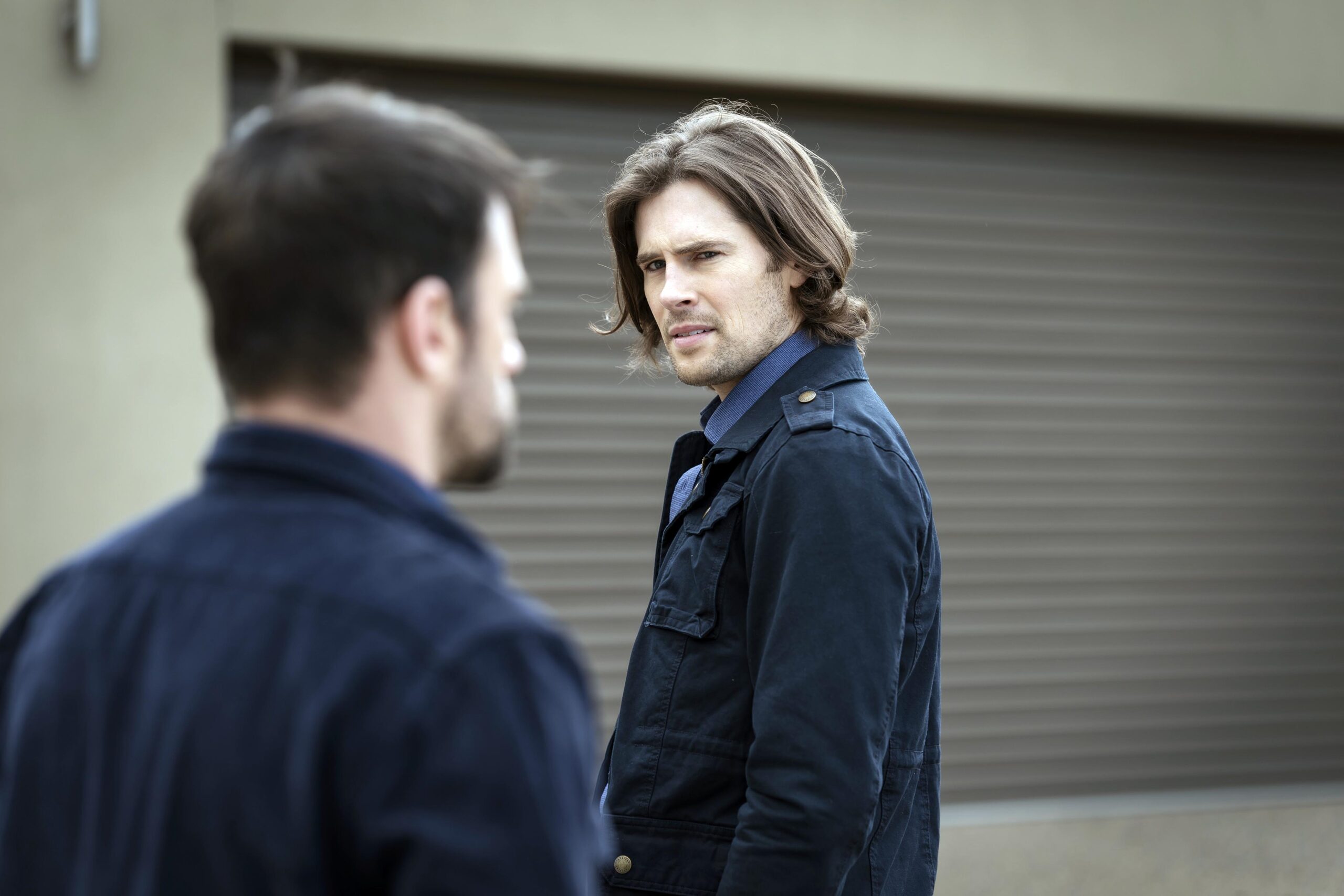 Dan looks at Michael with a puzzled expression in Riptide episode 2