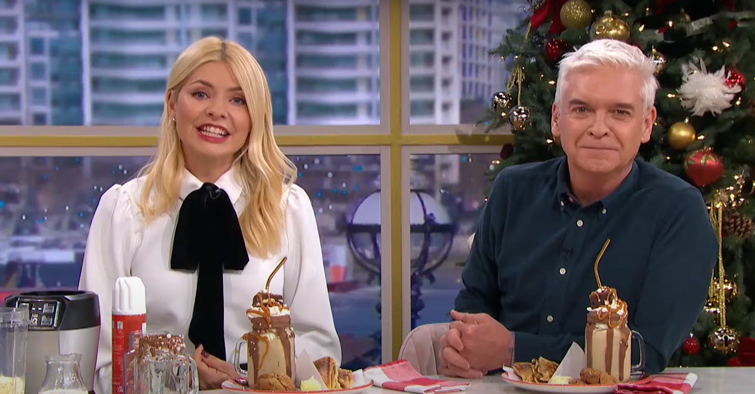 Holly Willoughby and Phillip Schofield sitting together in the kitchen on This Morning today