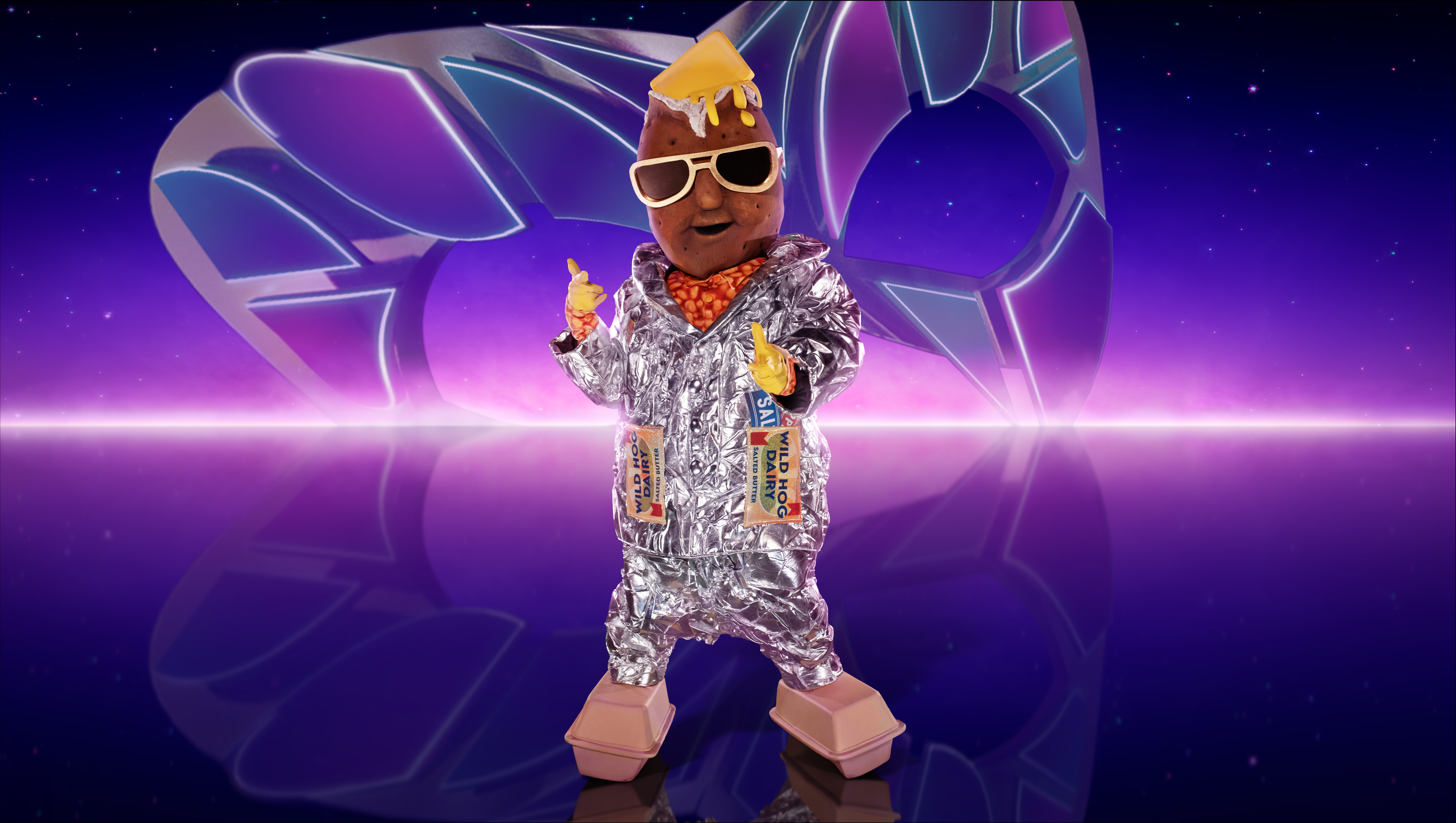Potato poses in silver suit on The Masked Singer