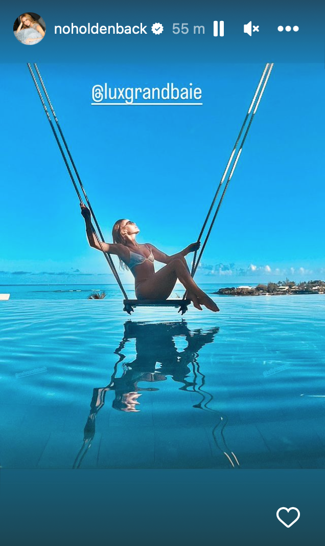 Amanda Holden posing in the swimming pool