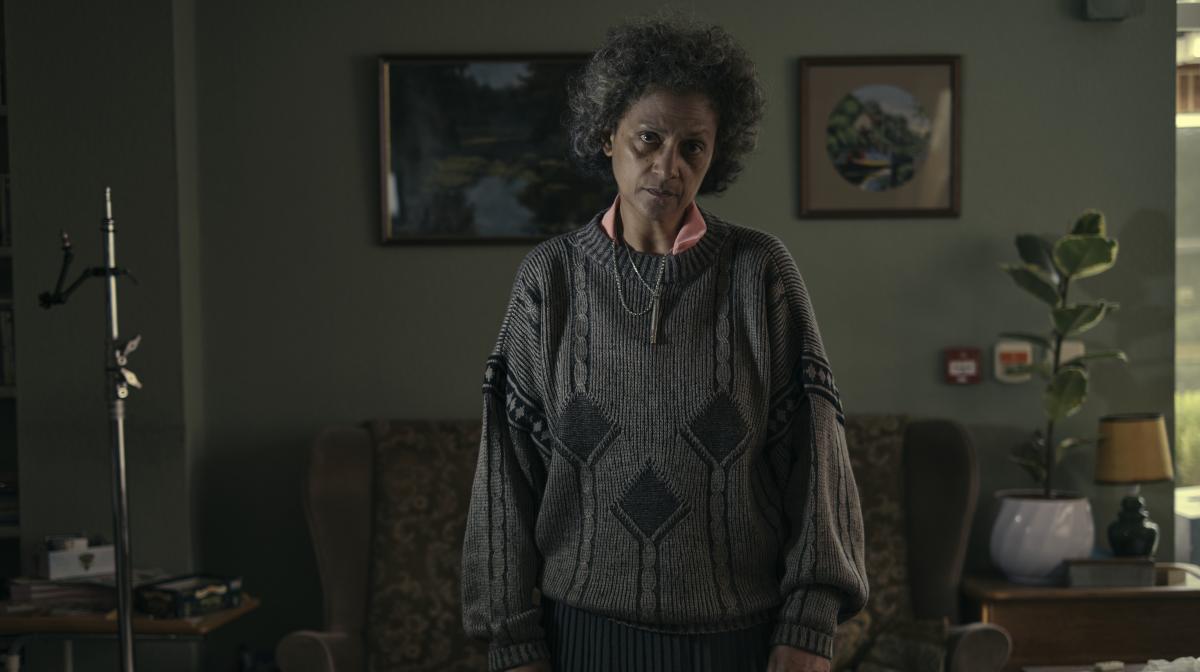 Polly frowns in the care home in Help