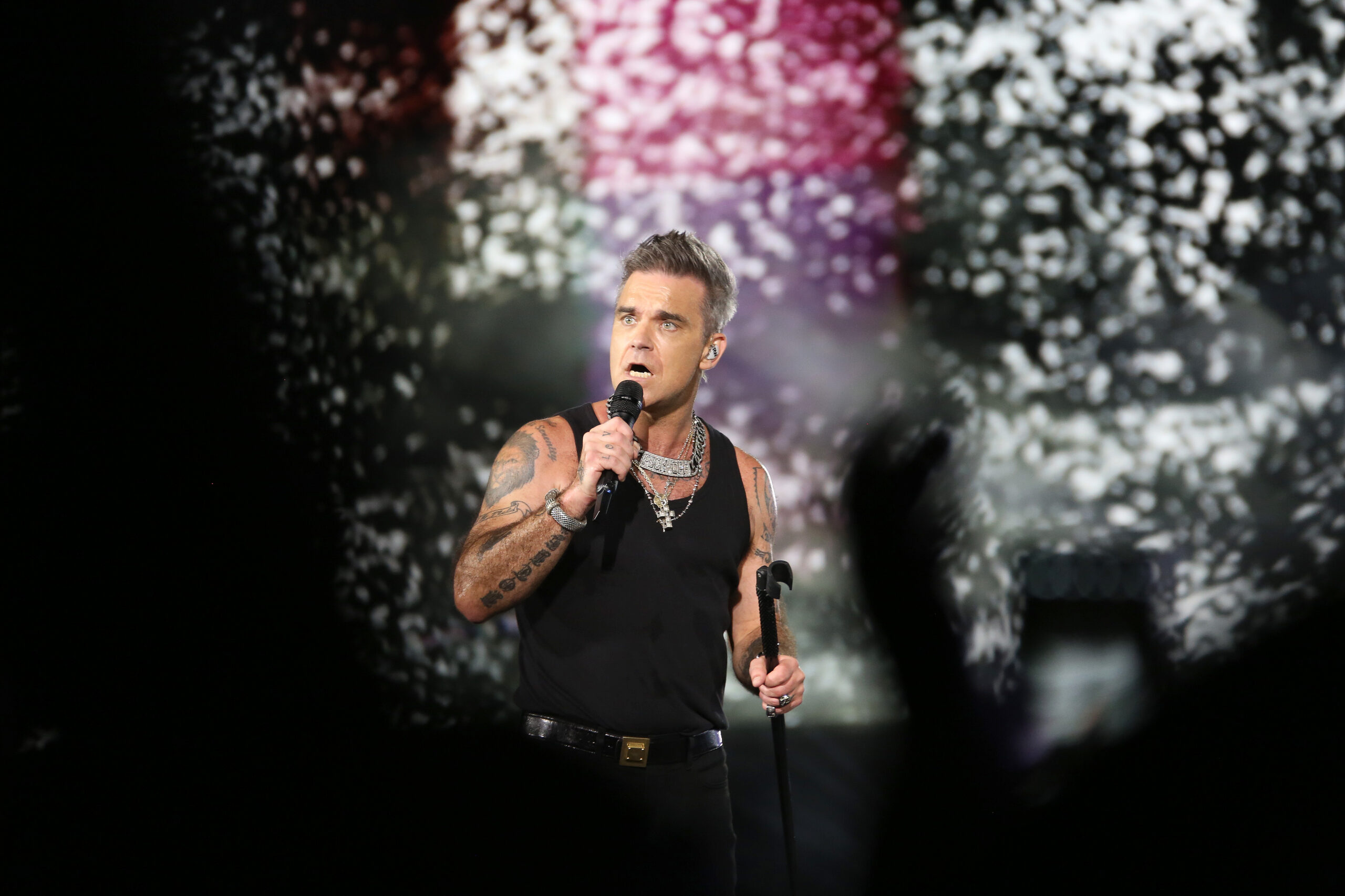 Robbie Williams performing
