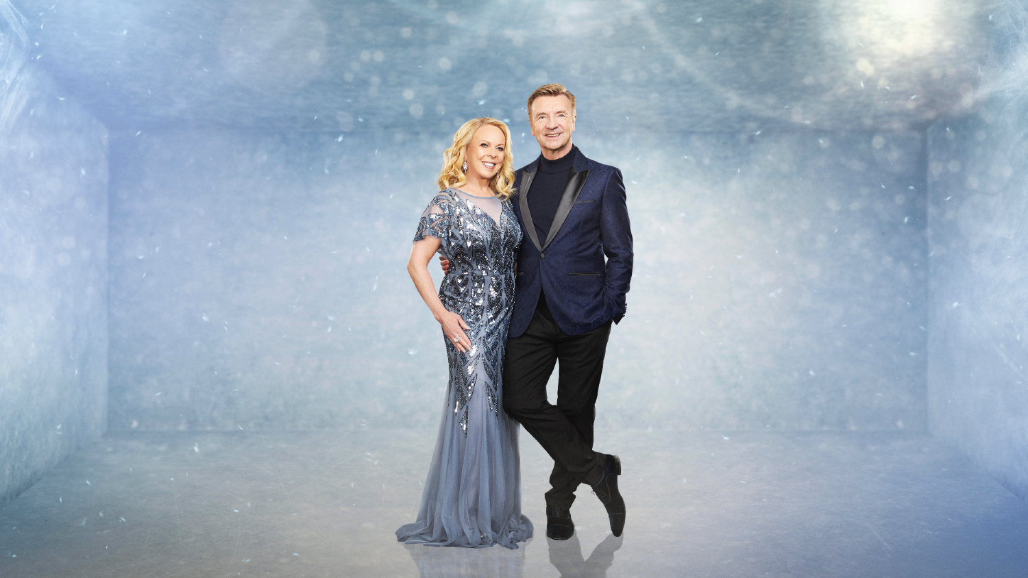 Christopher Dean standing with his arm around Jayne Torvill on Dancing On Ice 2023