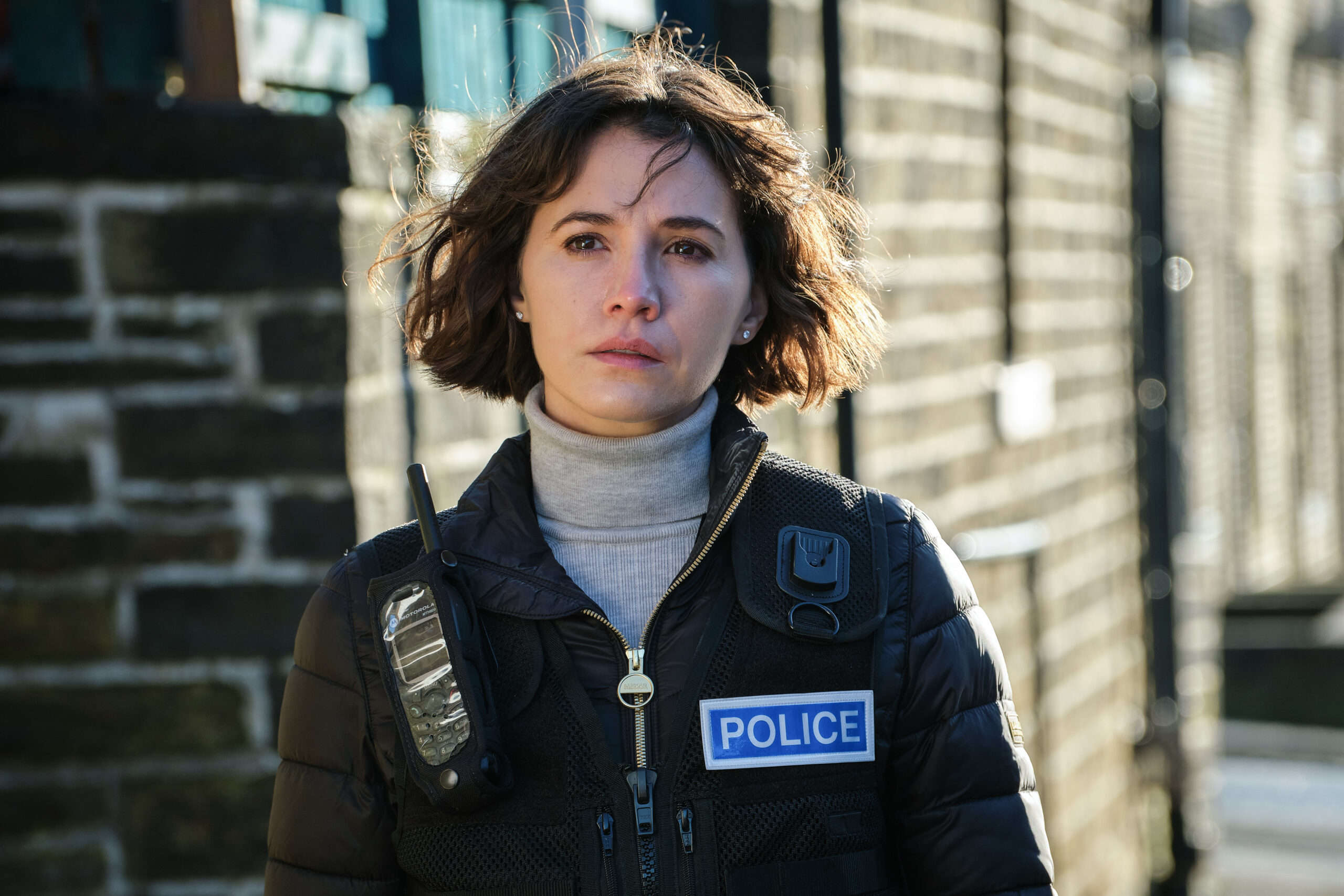 Ann stands in her police uniform in Happy Valley