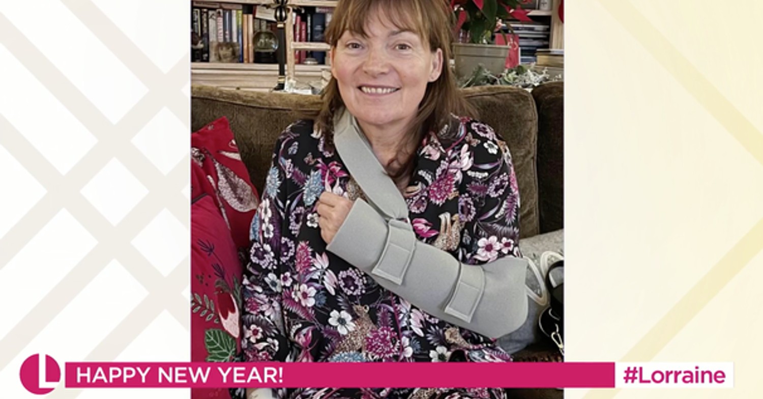 Lorraine Kelly wearing a sling after surgery