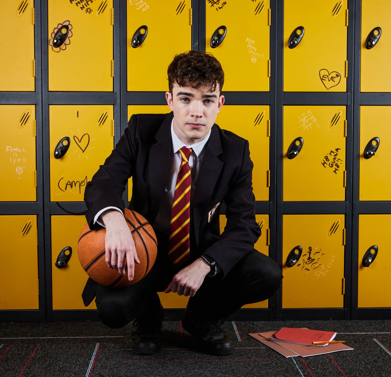 Preston Walters kneels in Waterloo Road