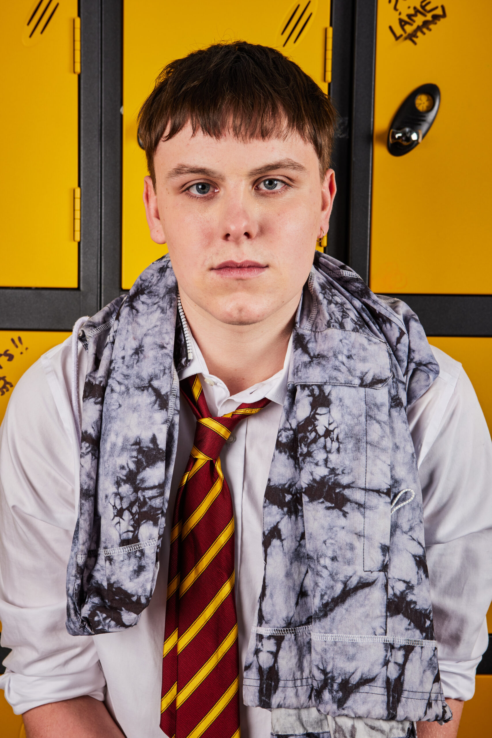 Noel McManus leans against his locker