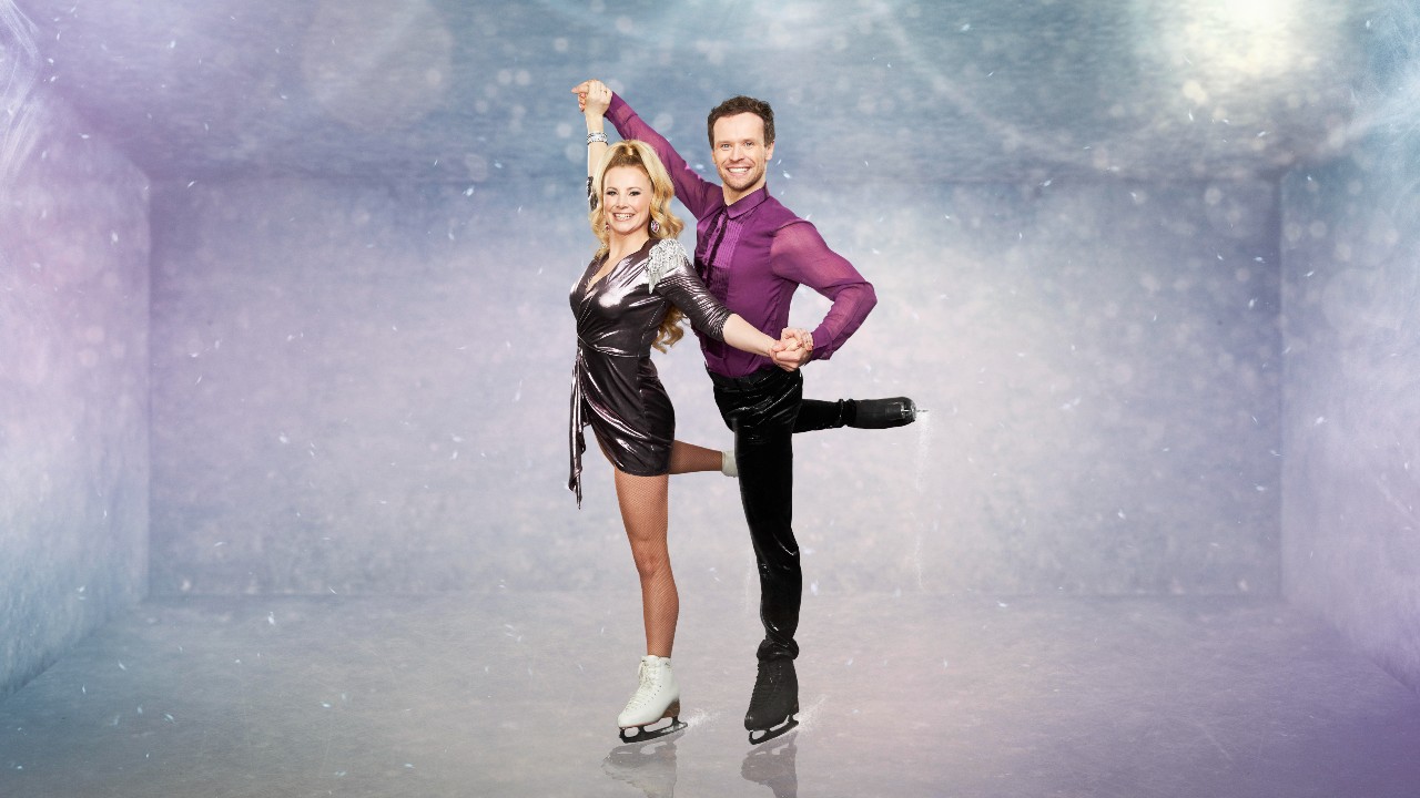 Carly Stenson and Mark Hanretty pose together